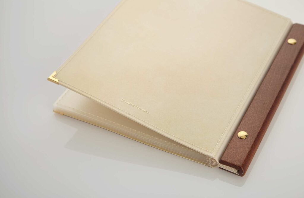 Menual cards with a wooden rail with hay